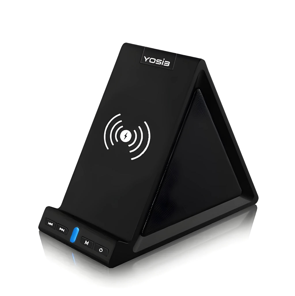 Black multifunctional Bluetooth speaker with integrated phone stand and wireless charging pad on a desk.