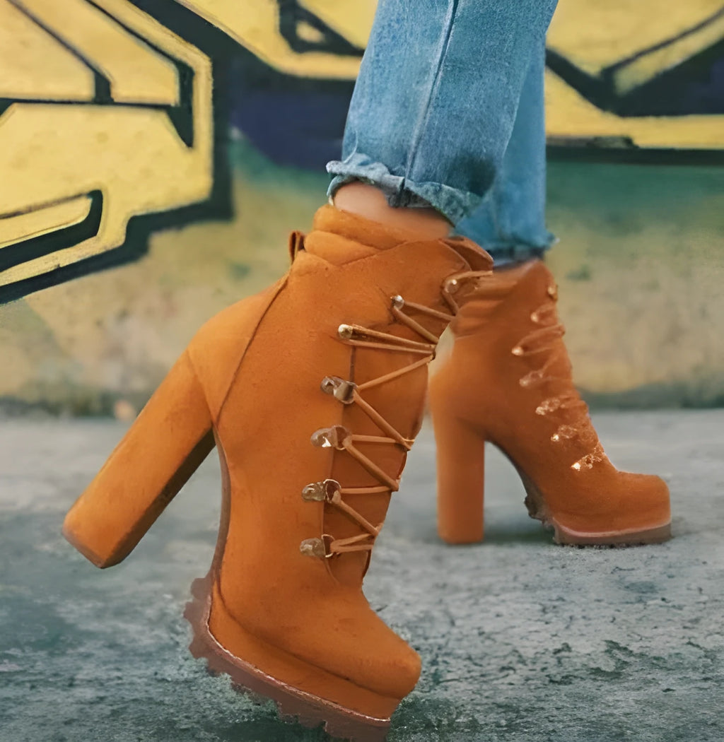 Women's suede high heel ankle boots with thick heel, round toe, and buckle detail in four colour options