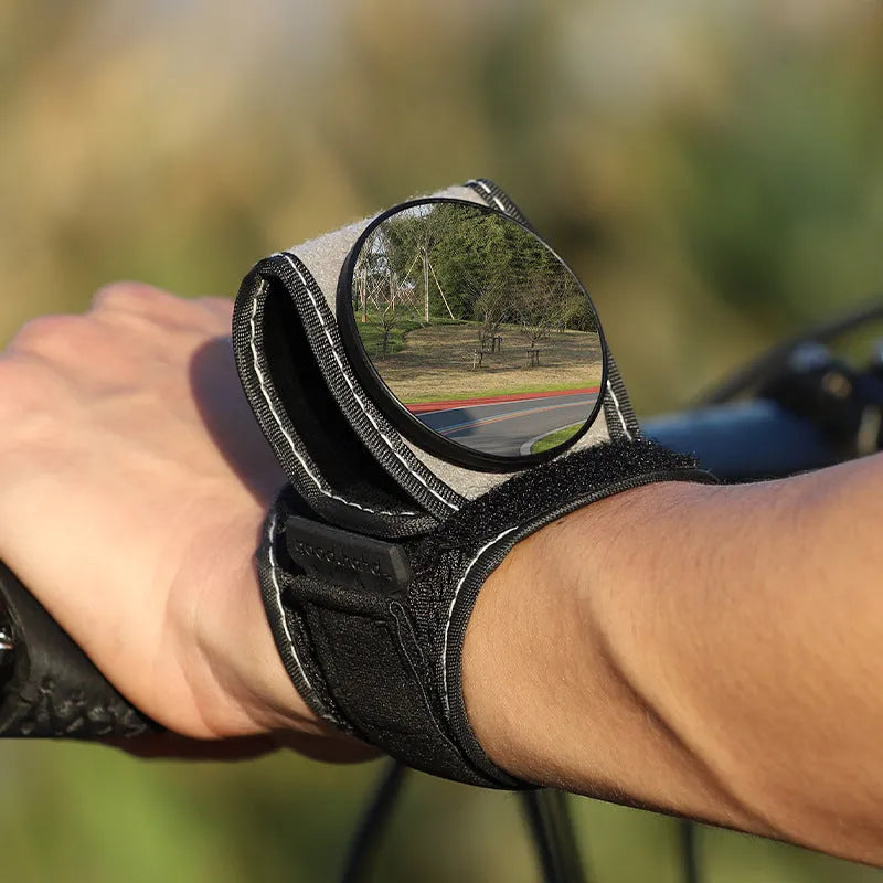 Black nylon bicycle wrist rear-view mirror for cycling safety and improved rearward visibility