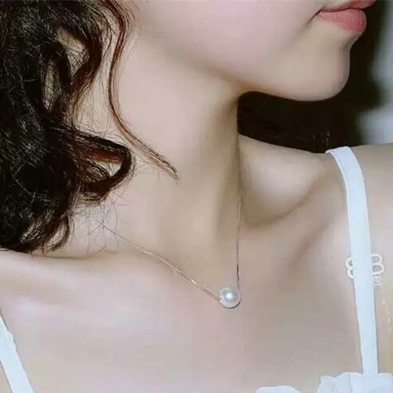 Geometric copper clavicle necklace with pearl elements and box chain in silver