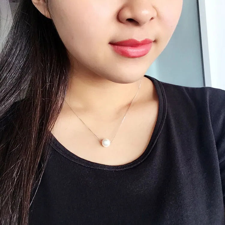 Geometric copper clavicle necklace with pearl elements and box chain in silver