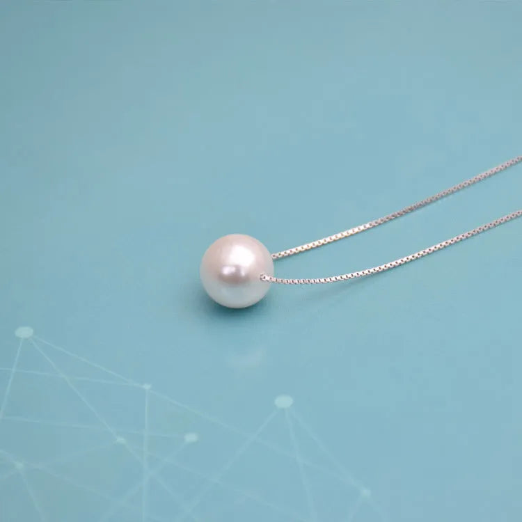 Geometric copper clavicle necklace with pearl elements and box chain in silver