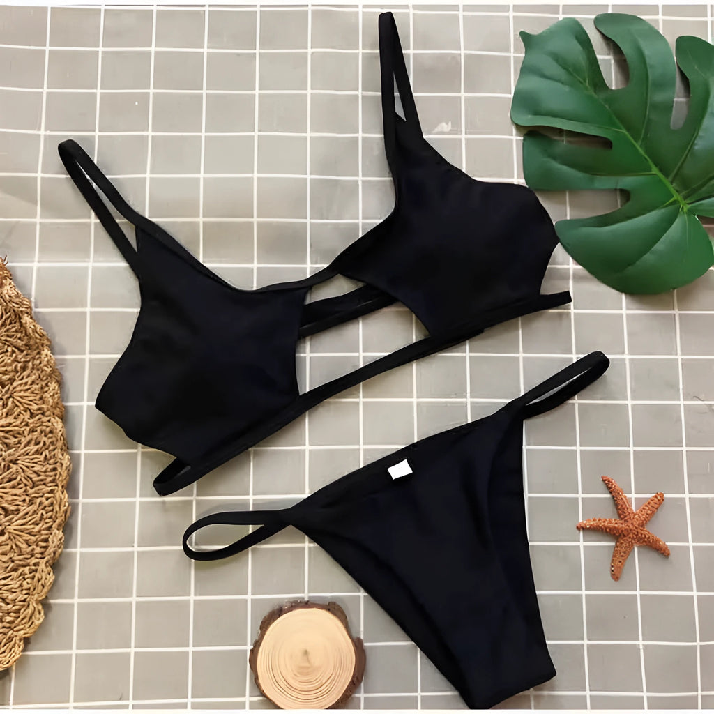Ladies two-piece bikini swimwear set in polyester and spandex, available in black or red, sizes S M L
