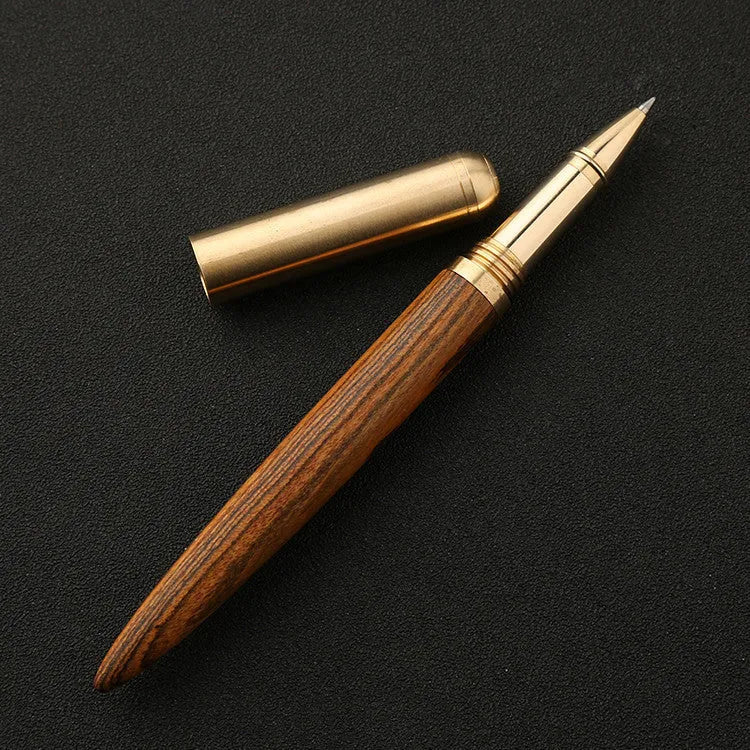 Brass and sandalwood signature pen showing wood grain and metal details at 14cm length