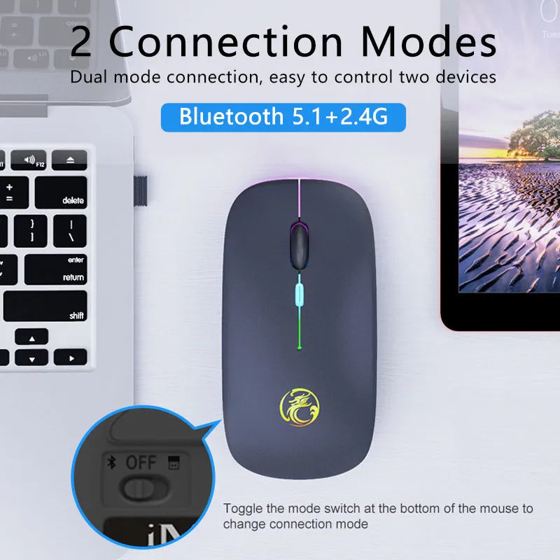 Black or white luminous charging dual-mode silent wireless mouse on a desk next to a laptop, showing its compact 112x57x25mm size.