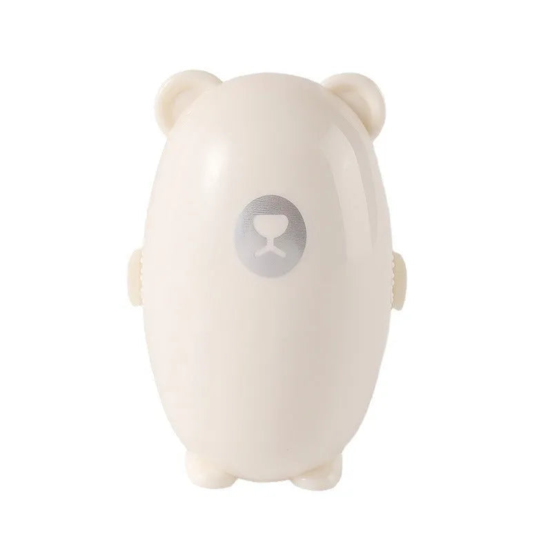Washable reusable lint roller in white, pink, or green for removing lint from clothes and furniture.