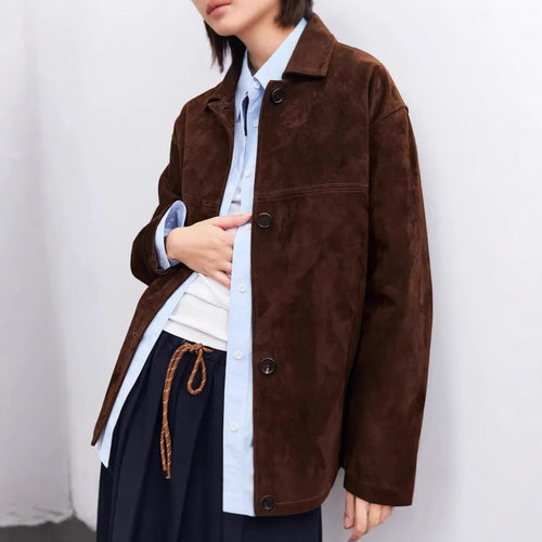 Yellow Brown loose-fit cashmere coat with Peter Pan collar and leather stitching details on front.