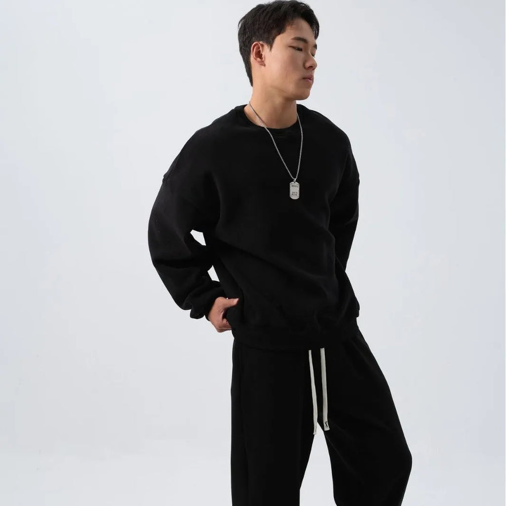 Men's polar fleece winter sports suit two-piece set showing padded jacket and matching trousers