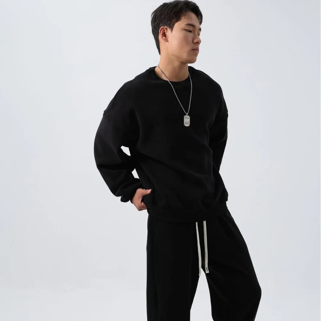 Men's polar fleece winter sports suit two-piece set showing padded jacket and matching trousers