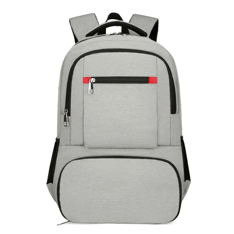 Light grey insulated Oxford cloth backpack with curved shoulder straps and multiple compartments.