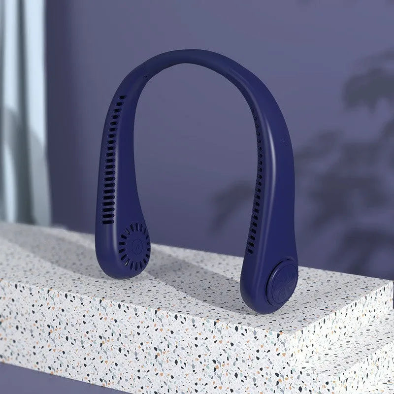 White portable bladeless neck fan being worn, showing its flexible band and streamlined air outlet.