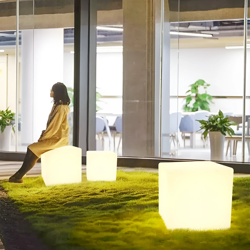 Modern square LED cube light for outdoor garden use, shown in various sizes.