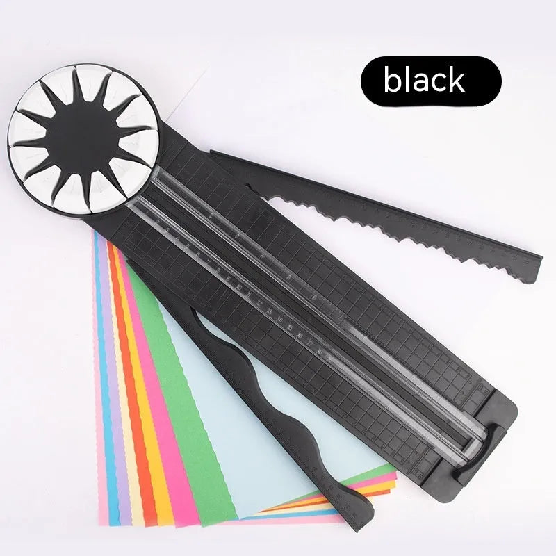 A pink plastic 12-in-1 multifunctional paper cutter with a dotted design on a flat surface.
