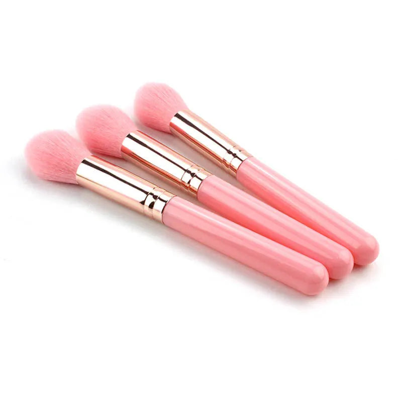 Pink blush brush with corrugated silk nylon wool bristles and plastic handle for highlight application