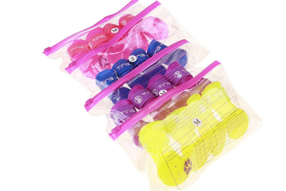 Candy pet rain boots in resin PVC, waterproof non-slip dog shoes, cartoon style, seven colours, sizes S to XXL