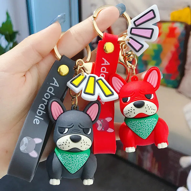 Tide Brand French keychain with metal pendant and PVC body in red, yellow, and grey bucket styles.