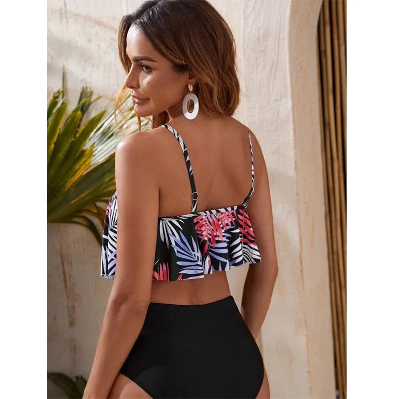 Women's white floral print high-waist bikini swimsuit laid flat.