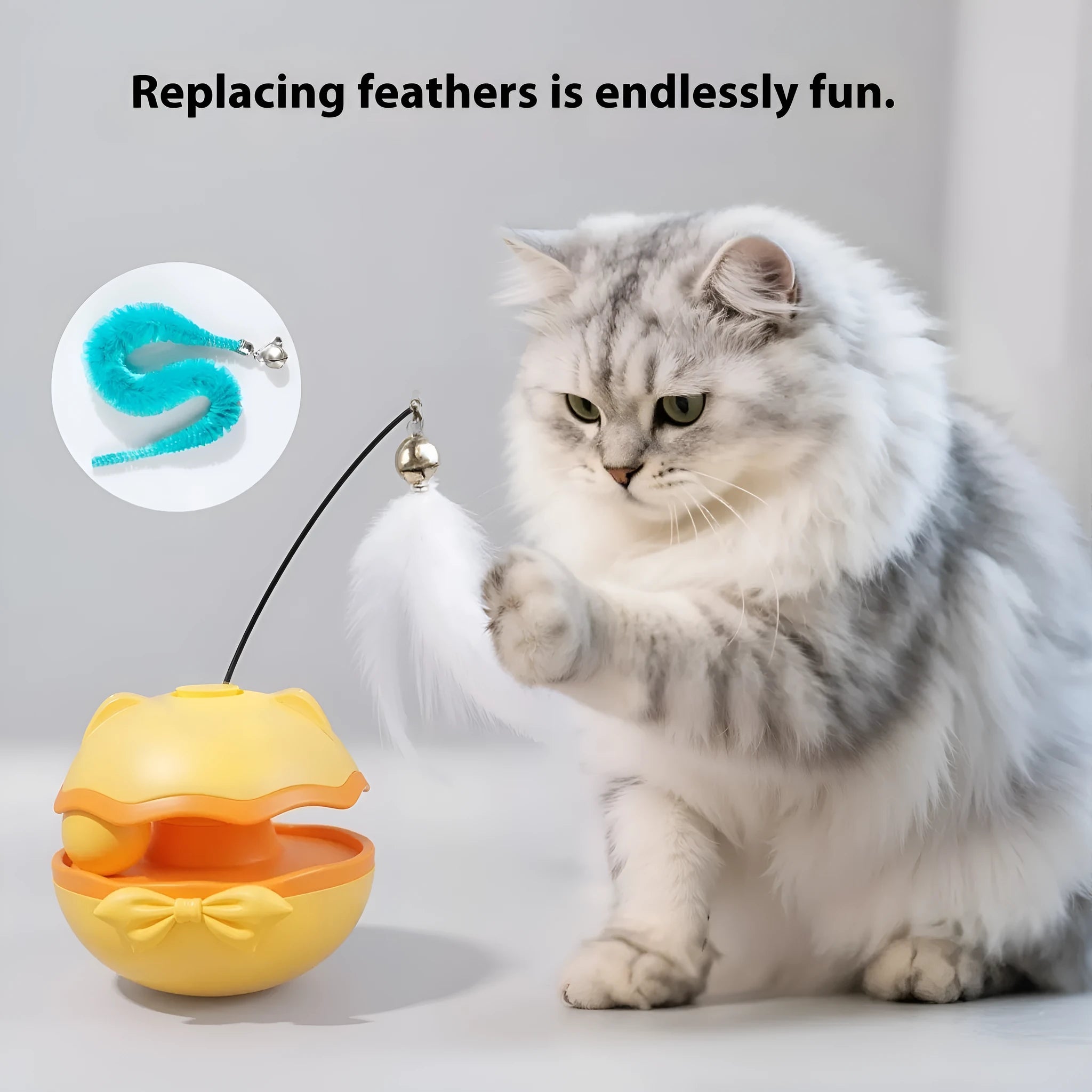 Electric cat toy tumbler in soft fog grey rolling on a wooden floor.