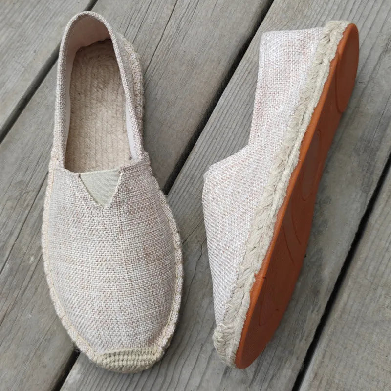 Men's solid colour canvas casual shoes with round toe in black, grey, white, dark brown, or light brown.