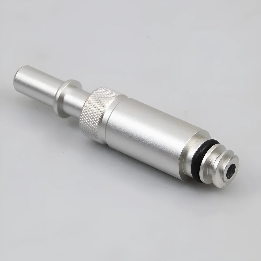 Silver metal VAS6262-9 transmission refueling joint tool on a workshop bench.