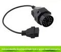 OBD2 adapter cable with a black BMW 20-pin plug and a standard 16-pin female OBD2 socket on the ends.