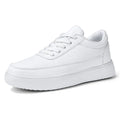 Women's white leather casual flat lace-up shoes on a neutral background, showing front and side views.