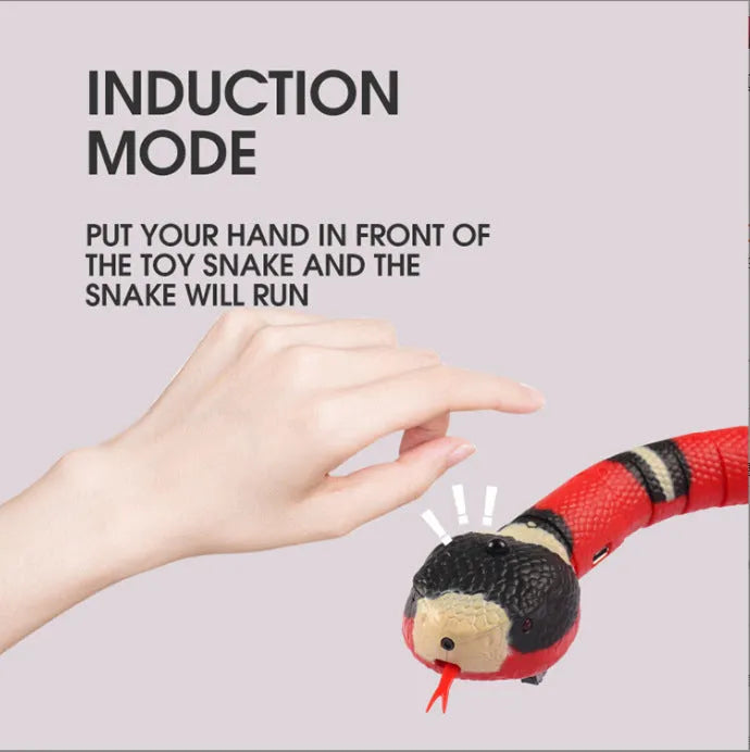 Interactive electric induction snake cat toy with S-shaped crawling and flashing eyes on a carpet