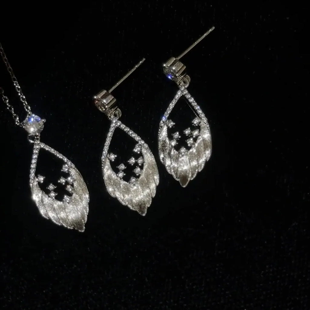 Sterling silver brushed feather spot drill stud earrings for women in white gold colour
