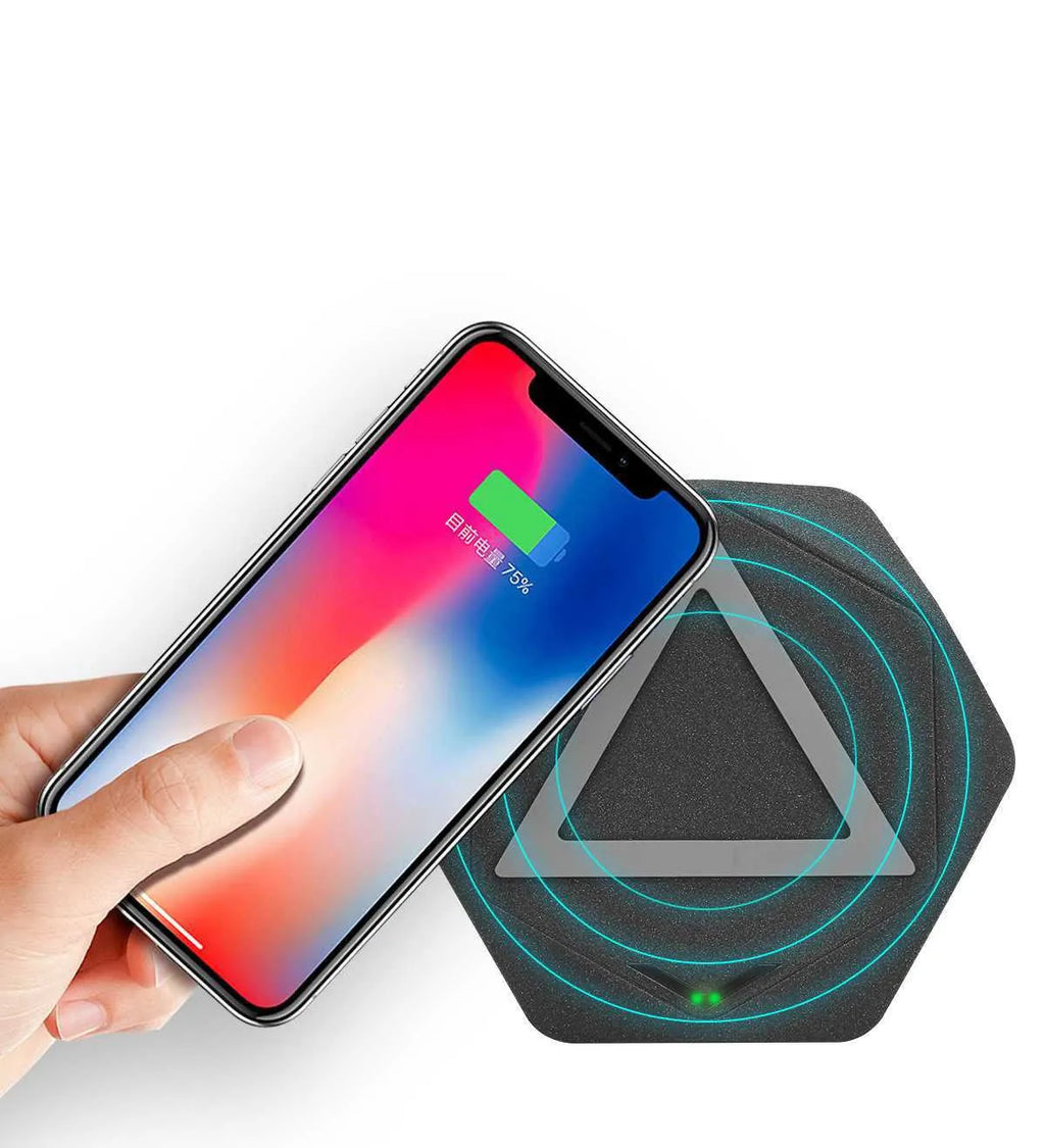 Frosted wireless Qi charger with LED indicator in black colour on a desk