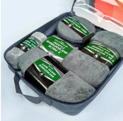 9-piece car wash cleaning kit with polyamide towels, sponge, tyre brush, and waxing cakes in dark grey and orange