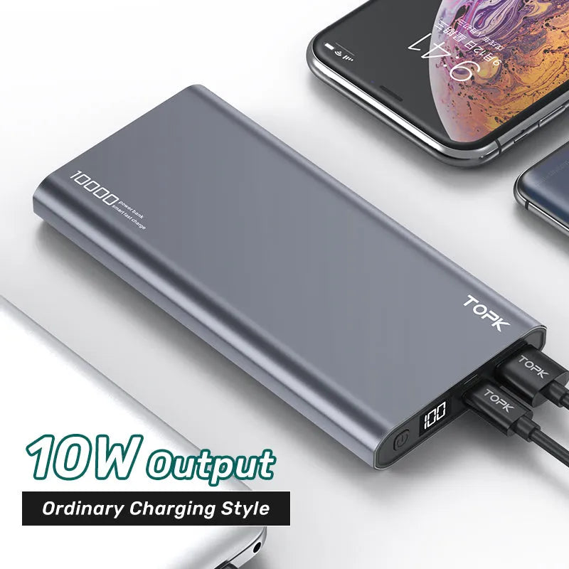 Silver 10,000 mAh fast charging power bank with digital display and metal shell on white background