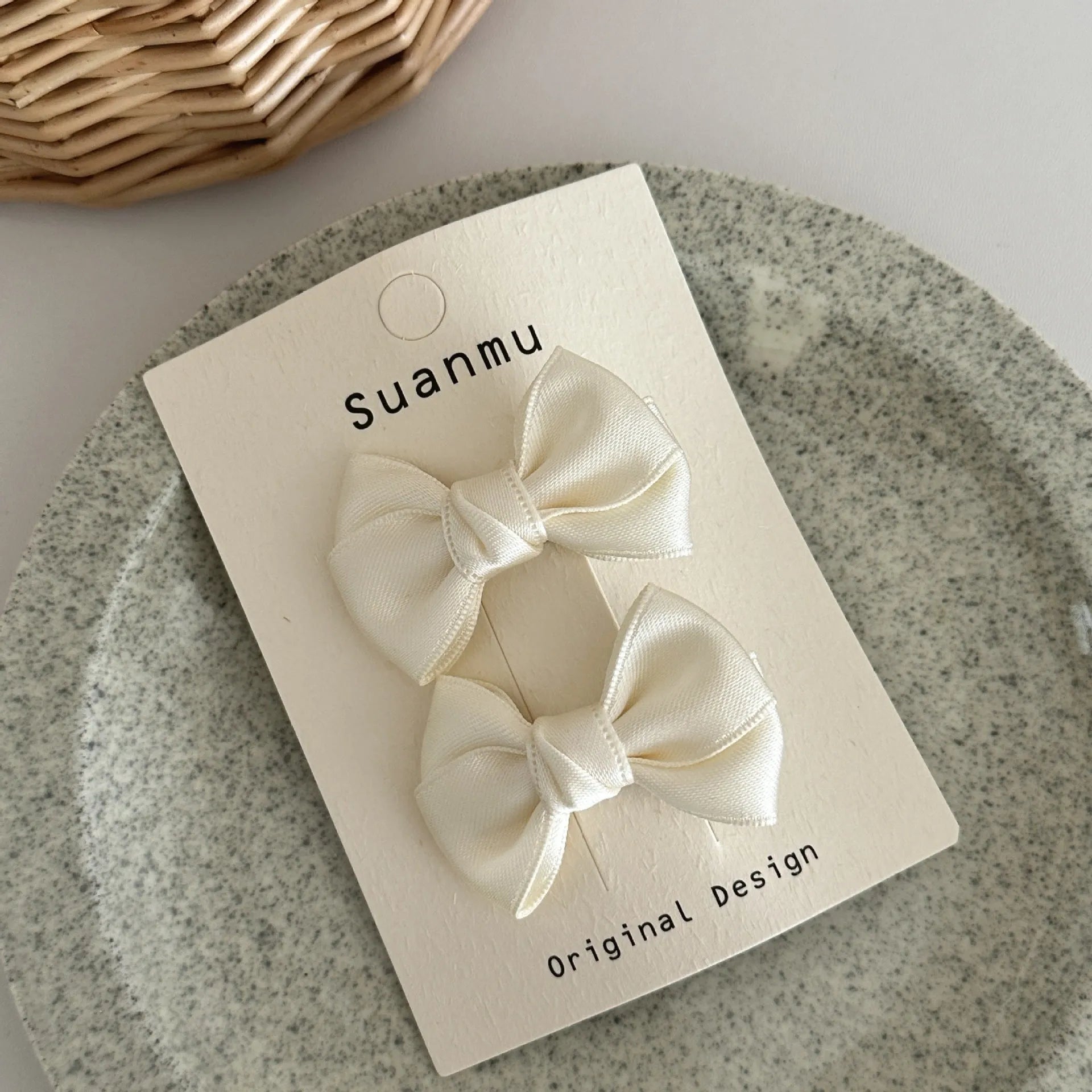 Fabric bowknot children's hair clip in cream colour with 6cm bow size on side clip