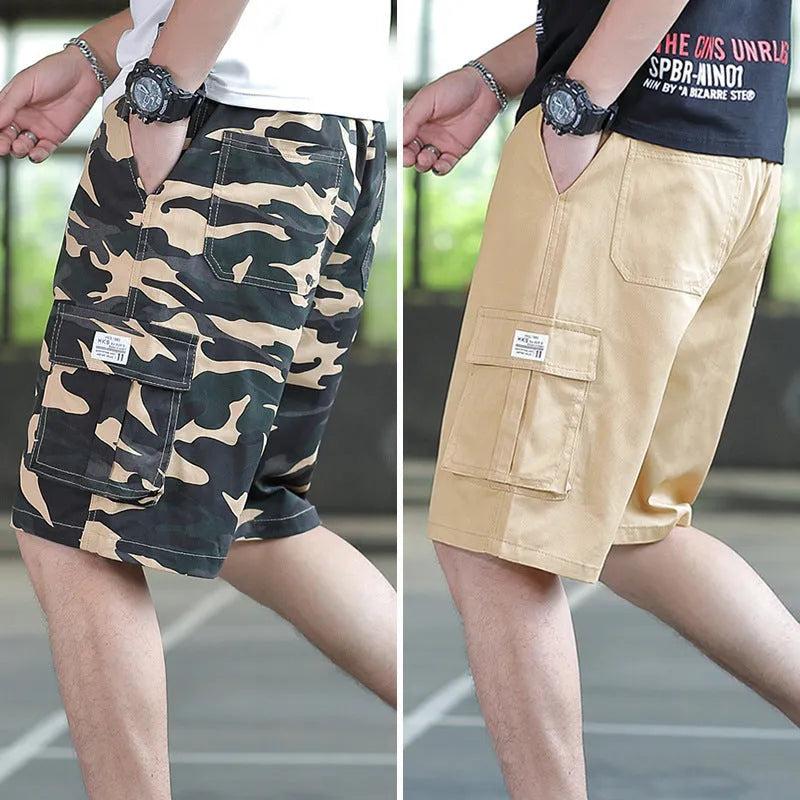 Man wearing loose fit khaki Korean style cargo trousers with a slim silhouette.