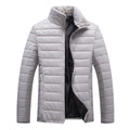 Men's hooded cotton padded jacket with candy-coloured zipper in black, grey, green, navy blue, red or sapphire blue.