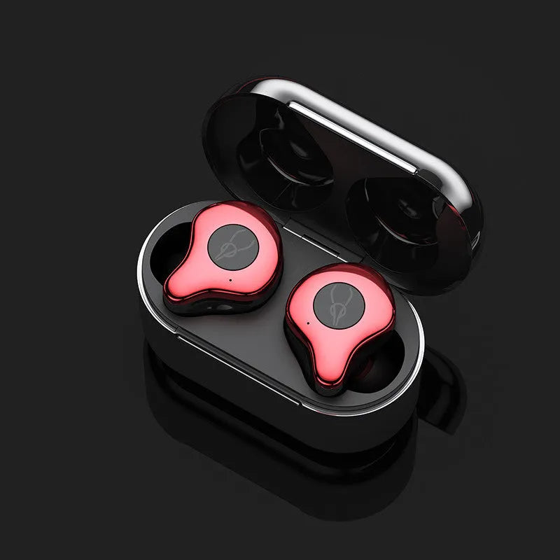 Coffee-coloured TWS wireless Bluetooth earbuds sitting in their open charging case.