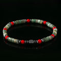 Bohemian men's bracelet with cylindrical natural stone beads on a woven string.