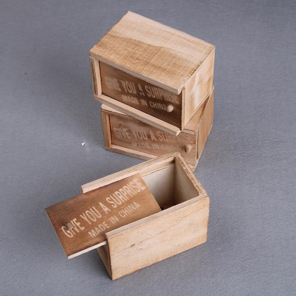 Wooden prank box with jumping scorpion, gecko or mouse for April Fools jokes