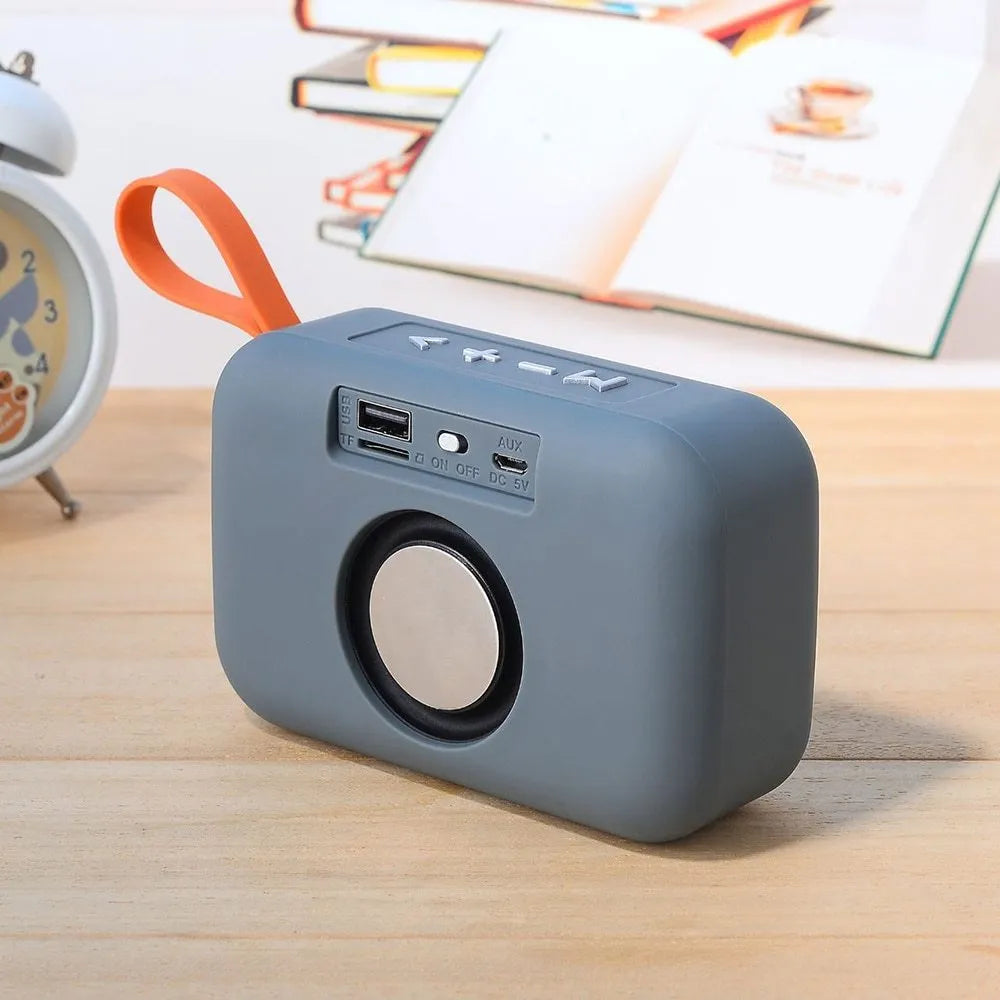 Compact sports Bluetooth speaker in black with radio, USB port, and key controls