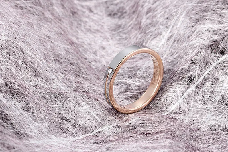 Female 4mm tungsten carbide ring with round zirconia stone, silver finish, available sizes 5-13