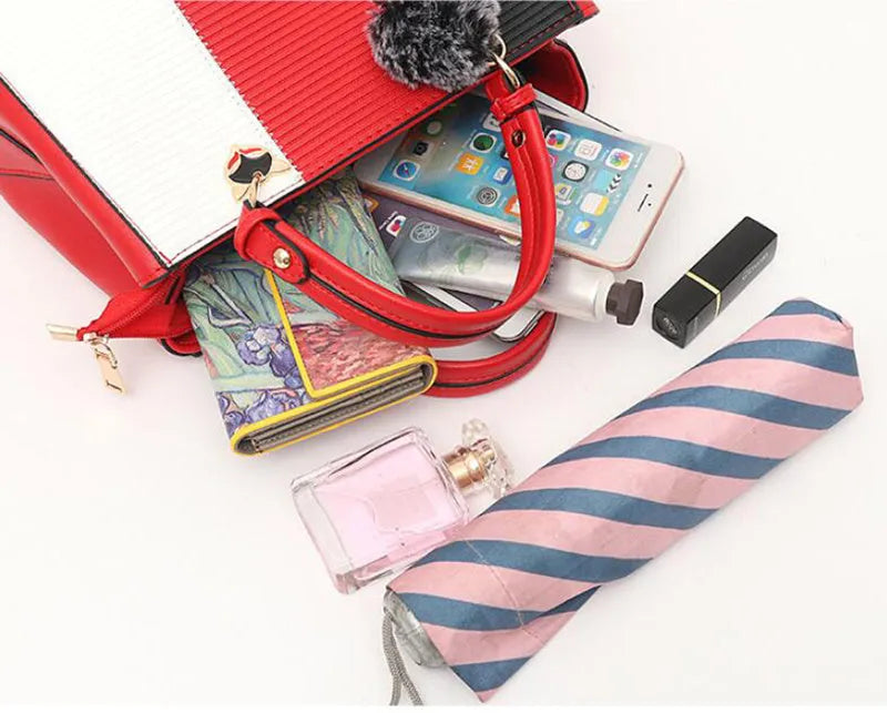 Women handbag made of PU leather with patchwork design and hairball ornaments in grey, pink, purple, and red colour options