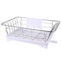 Black stainless steel dish drying rack with cutlery holder and drainboard on a kitchen counter.