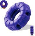 Blue, green, and red beef-flavoured tyre-shaped dog chew toy made from natural rubber.