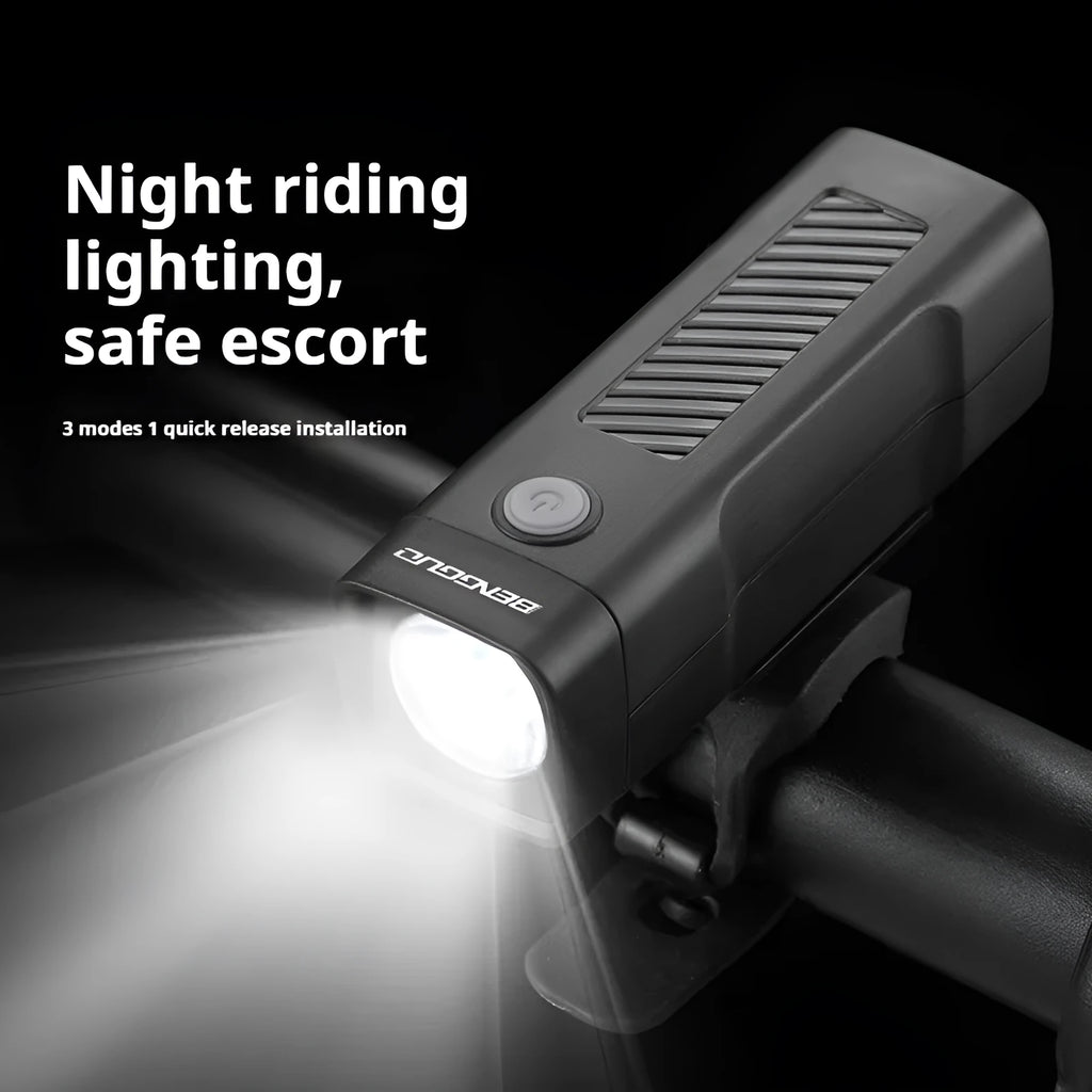 USB rechargeable bicycle headlight with LED lamp and quick release strap bracket on handlebars.