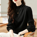 Women's slim fit half turtleneck striped shirt in apricot colour on a hanger