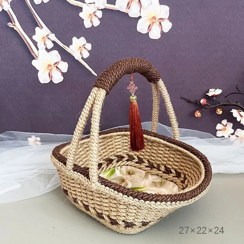 Hand-woven straw basket with hemp rope detail in coffee brown colour.