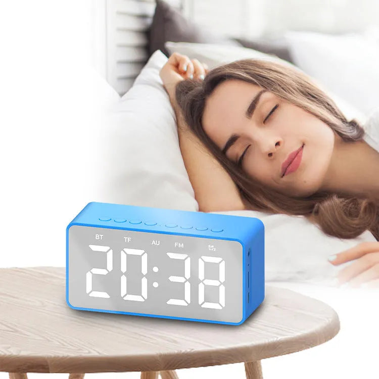 Alarm clock Bluetooth speaker model BT506 in black with digital display, Bluetooth and MicroSD icons