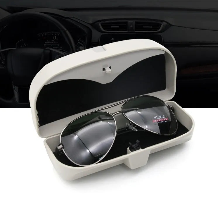 Car glasses case clipped onto sun visor, 170x70x55mm, silver coated tape and steel wire construction