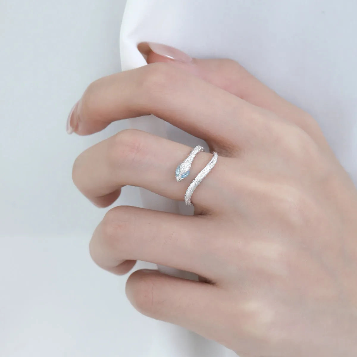 Adjustable opening silver snake ring with electroplated platinum colour finish, animal zodiac design