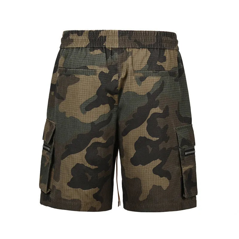 Men's green washed camouflage cotton workwear shorts with loose fit and mid waist design