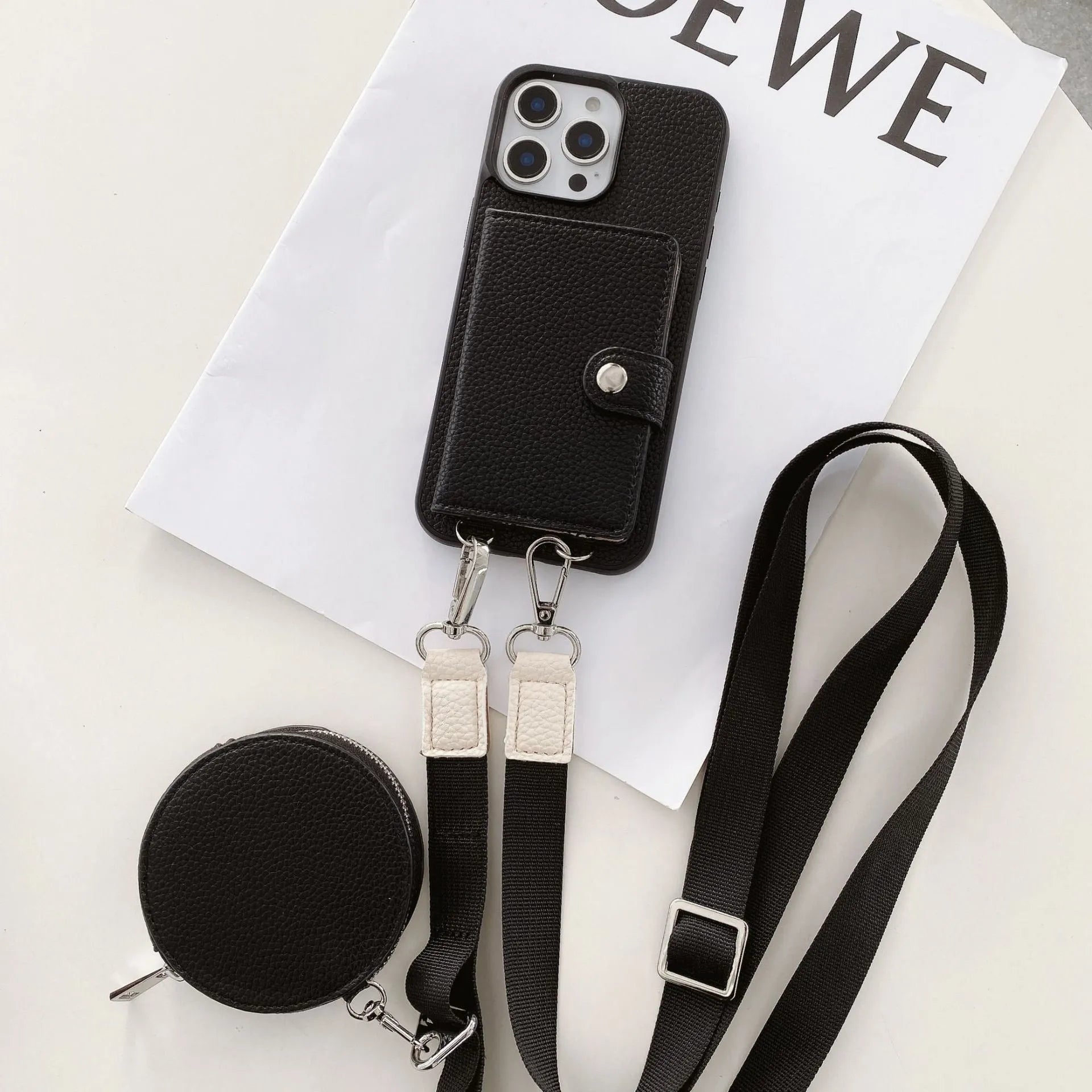 Slim black PC leather iPhone case with a built-in card slot and a lanyard loop on the corner.